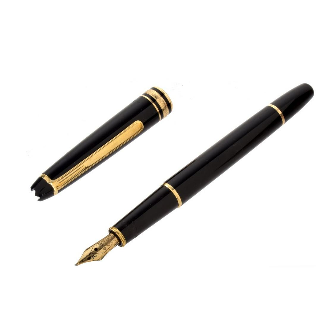 Montblanc Pen: Montblanc MeisterstÃ¼ck Black Composition and Gold Plated Fountain Pen. 14K yellow gold nib with engraved detail. Edition of 4810. Measures 5-1/4" x 1/2". From the collection of The Honorable Ned L.