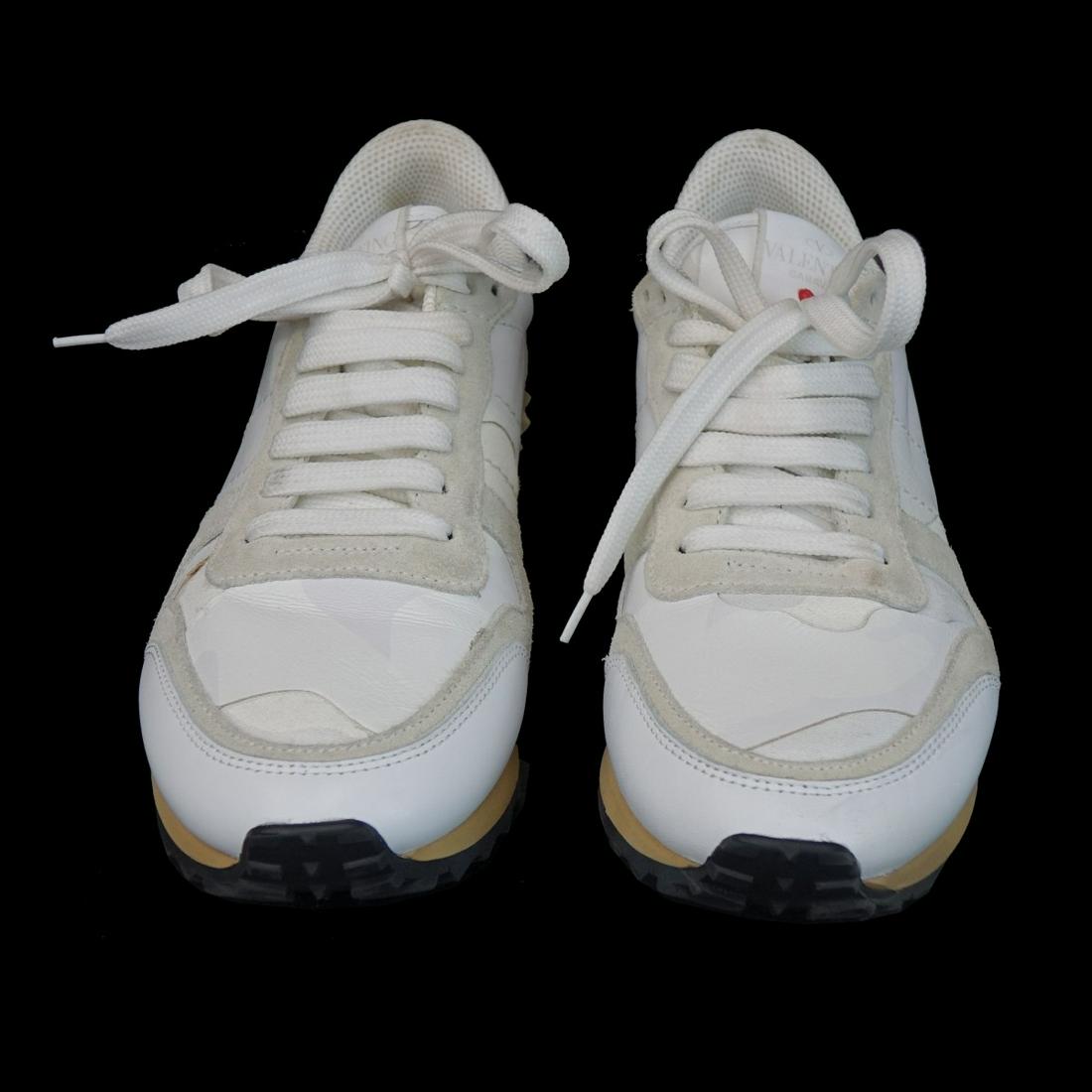 Womens Valentino Sneakers: Womens Valentino Garavani Rock Runner Sneakers. Serial number is slightly faded but present. Appropriately labeled. Size: 38. Property of Ms Orianne Collins.10% of the proceeds with be donated to the