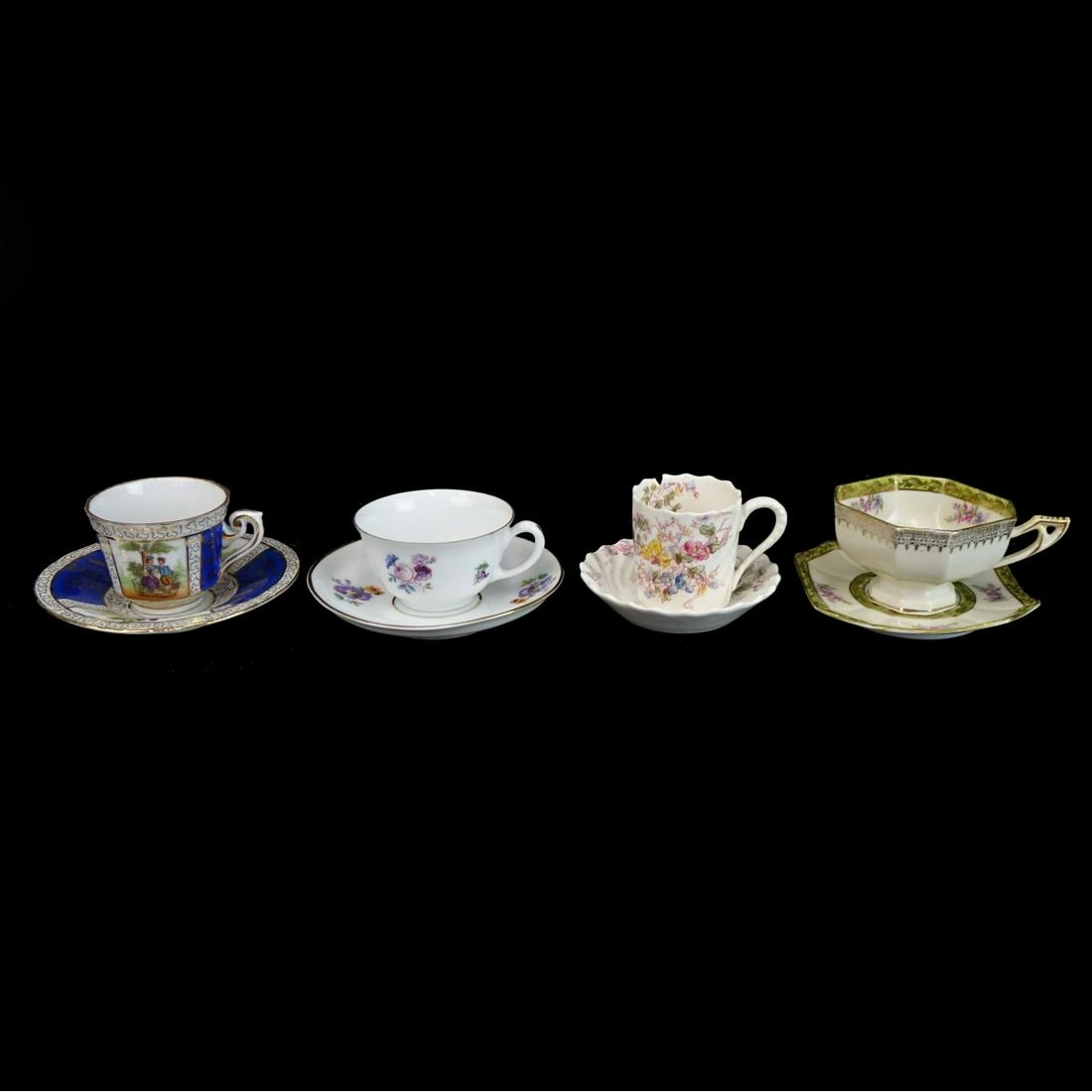 Demitasse Sets: Lot of Four (4) Demitasse Cups and Saucers. One is marked Copeland, another is by Furstenberg. Largest cup measures 2", smallest cup measures 1-1/2". Condition: Copeland cup has a loss and crack to th