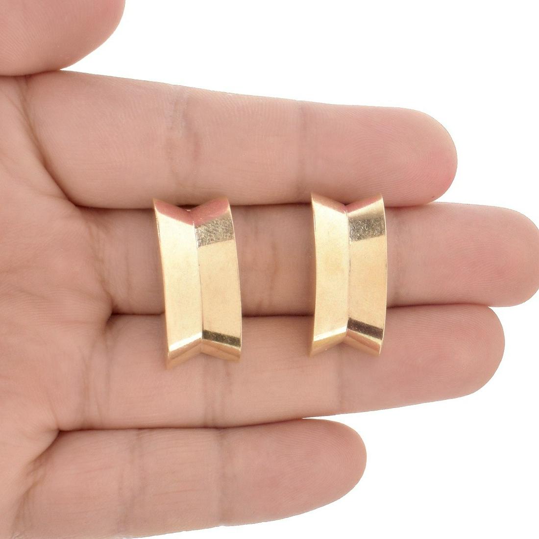 14K Earrings: Retro Circa 1940's 14 Karat Yellow Gold Clip Back Earrings. Stamped 14K. Measure 1" H, 1/2" W. Approx. weight: 14.03 grams. Condition: Very good vintage condition. Estimate: $200.00 - $500.00 Domestic