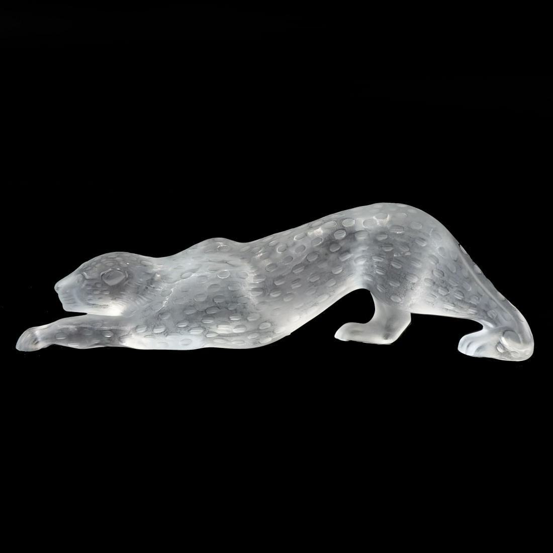 Lalique Panther: Lalique Zeila Clear Frosted Crystal Panther. Signed (faded). Measures 4" x 14-1/2". Condition: Good condition. Estimate: $200.00 - $400.00 Domestic Shipping: $78.00