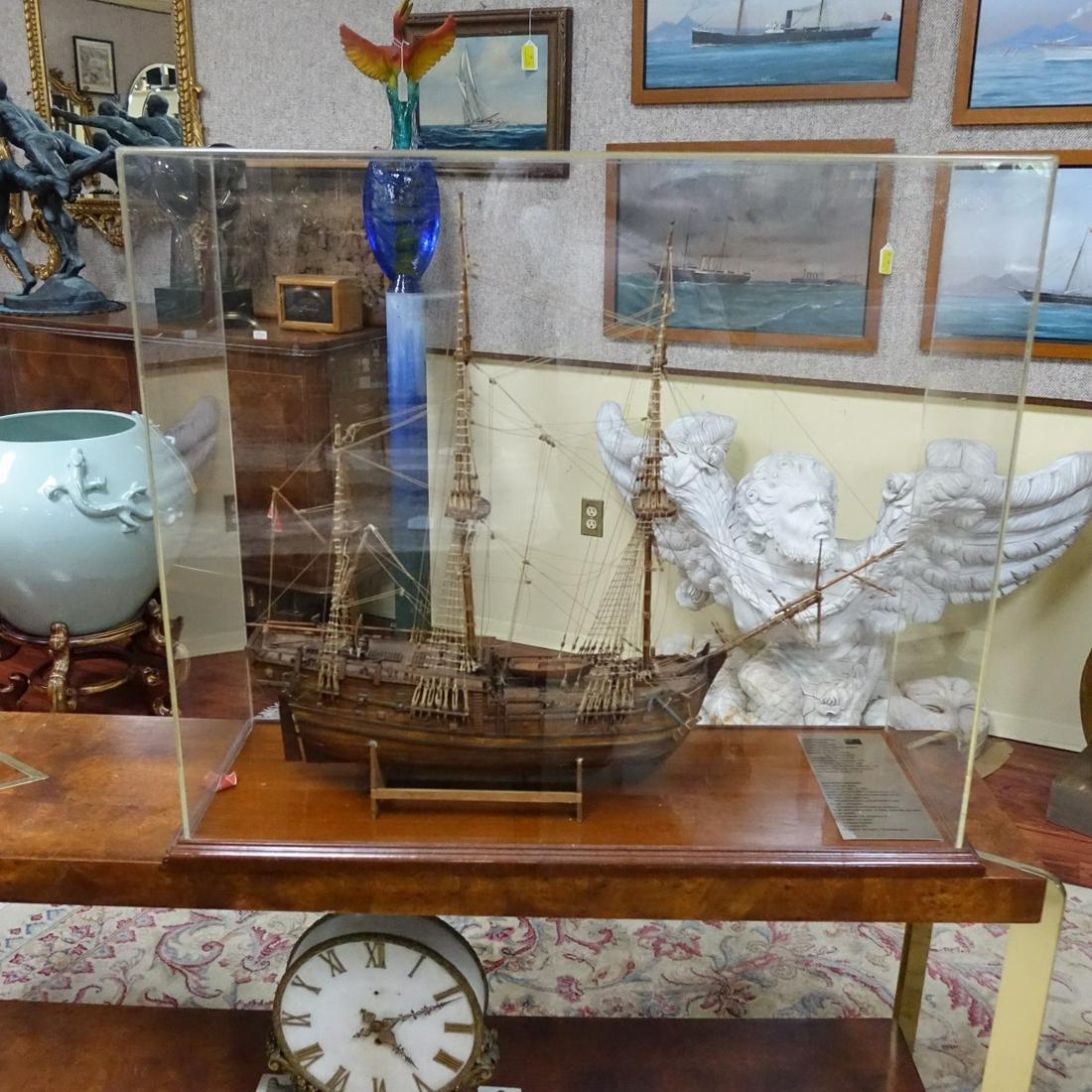 Large "Endeavor" Galleon Ship's Model: Large Vintage British "Endeavor" Galleon Ship's Model in Display Case. Well detailed hull with three masts sails. Tag with ship's information affixed on interior. Presented on a wooden stand. Approx.