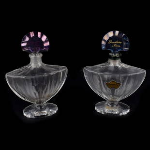 Baccarat Perfume Bottles: Pair of Early 20th Century Guerlain Shalimar Baccarat Perfume Bottles. Signed. Measures 6-1/2" x 4-1/2" x 2". Condition: One bottle has wear around the rim, other has rubbing to the inscription on the