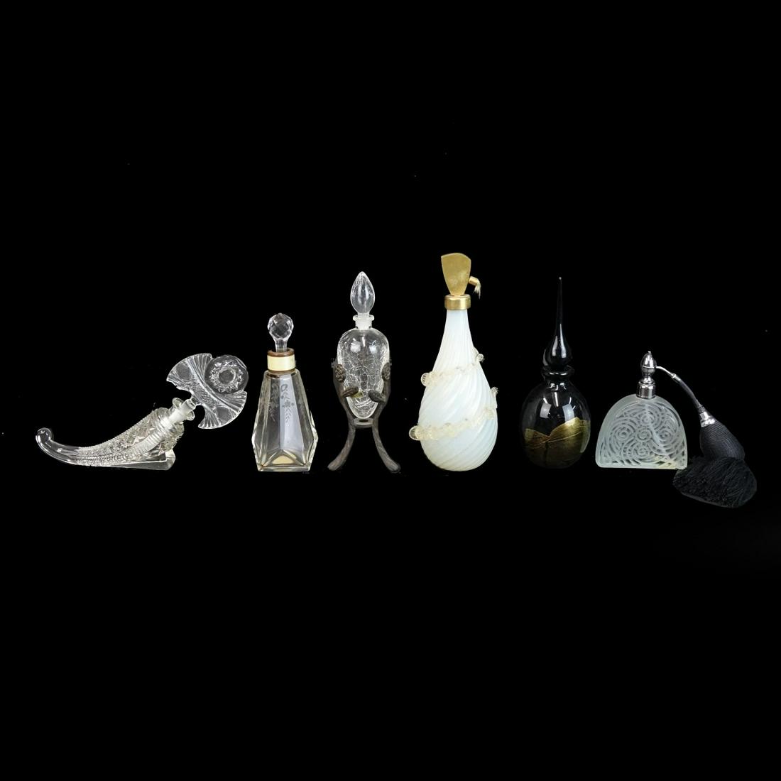 Perfume Bottles & Atomizers: Lot of Assorted Perfume Bottles and a Atomizers. One bottle has a Glass Act Studio label to the base, One atomizer is marked by Marcel Franck. Tallest bottle measures 7-3/4" x 2-3/4" (w/ stopper). Tal