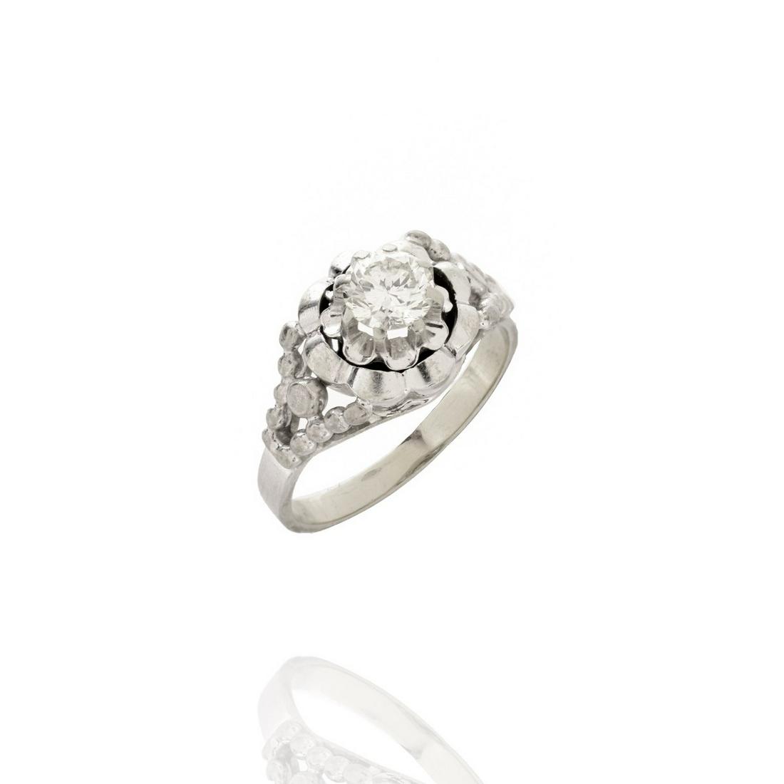 Diamond and 18K Ring: Vintage Approx. .50 Carat Round Brilliant Cut Diamond and 18 Karat White Gold Engagement Ring. Diamond G color, VS2 clarity. Ring size 5-1/4. Approx. weight: 3.69 grams. Condition: Very good pre-owned