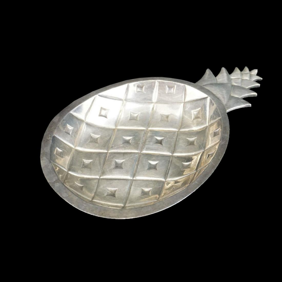 Tiffany & Co Candy Dish: Tiffany & Co Sterling Silver Pineapple Candy Dish. Stamped and numbered 23363. Measures 5/8" x 5-1/2" x 3-3/8". Approx. weight: 2.9 troy ounces. Condition: Very small ding to the rim otherwise good co