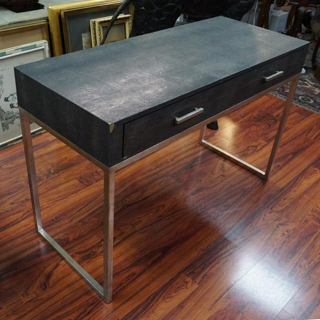 Sarreid Style Desk: Mid Century Sarreid Style Faux Shagreen Desk. Feature two doors and stands on a metal base. Measures 30-3/4" x 47-1/4" x 19-3/4". Condition: Surface loss to one corner, rubbing, some oxidation to the 