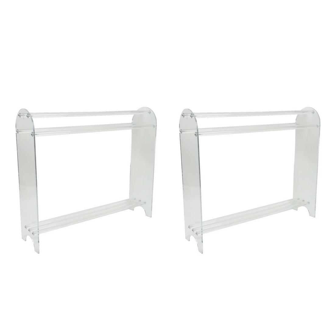 Lucite Racks: Two Mid Century Modern Lucite Racks. Includes a towel rack and a blanket rack. Towel rack measures 31-3/4" x 24-3/4" x 10". Blanket rack measures 31-1/2" x 36-1/2" x 9". Condition: Each having some su