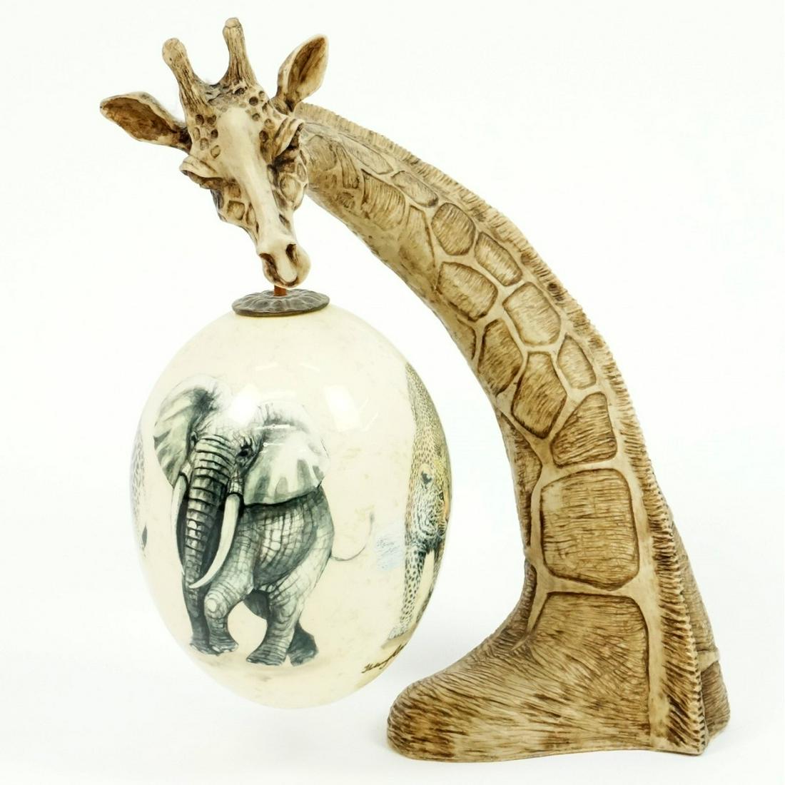Sherry Rowe Sculpture: Sherry Rowe Ostrich Egg and Safari Sculpture. Signed on the egg. Overall measures 11-1/2" x 9". Ostrich measures 6" x 4-1/2". Condition: Good condition. Estimate: $50.00 - $150.00 Domestic Shipping: $