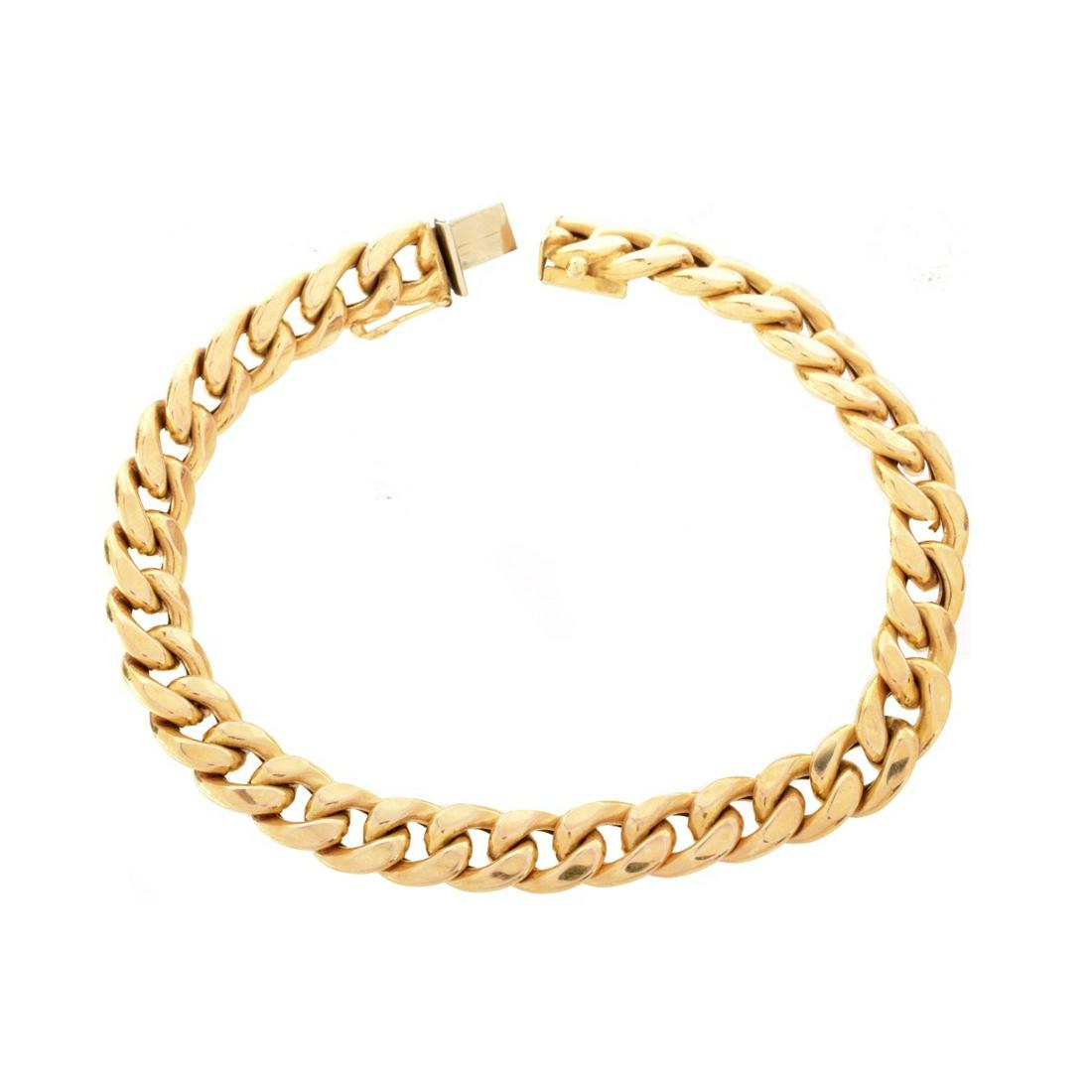 14K Bracelet: Vintage Italian 14 Karat Yellow Gold Cuban Link Bracelet. Stamped 14K Italy with hallmark. Measures 8" x 3/8". Approx. weight: 17.3 grams. Condition: Good condition. Estimate: $200.00 - $300.00 Domest
