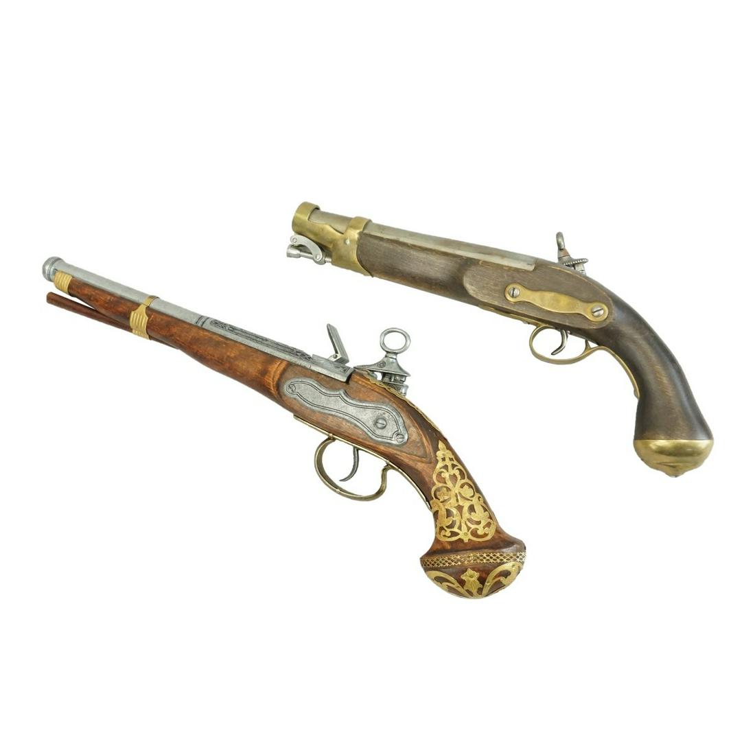 Percussion Pistols: Two Antique Style Percussion Pistols. One is marked â€œR. Cuerpo De Guard De La Persona Del Rey” and numbered 3o. 2A. No. 6 2. Largest measures 16-3/4". Other measures 13-3/4". Condition: Fi