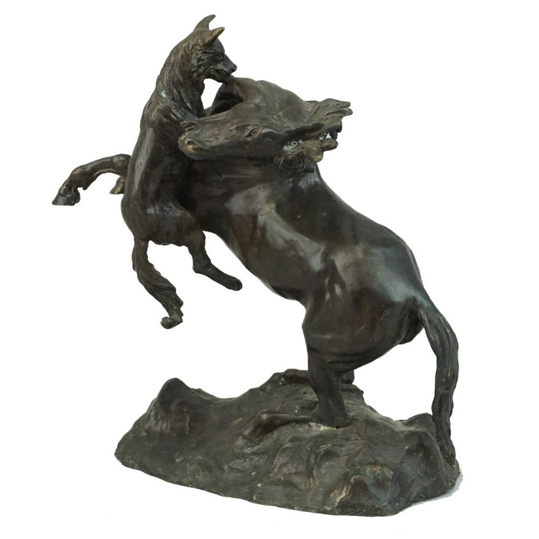 Bronze Sculpture: 20th Century Modern Bronze Sculpture of a Wolf and Horse. Unsigned. Measures 12-1/2" x 11-1/2" x 5-1/2". Condition: Rubbing and oxidation otherwise good condition. Estimate: $100.00 - $300.00 Domestic