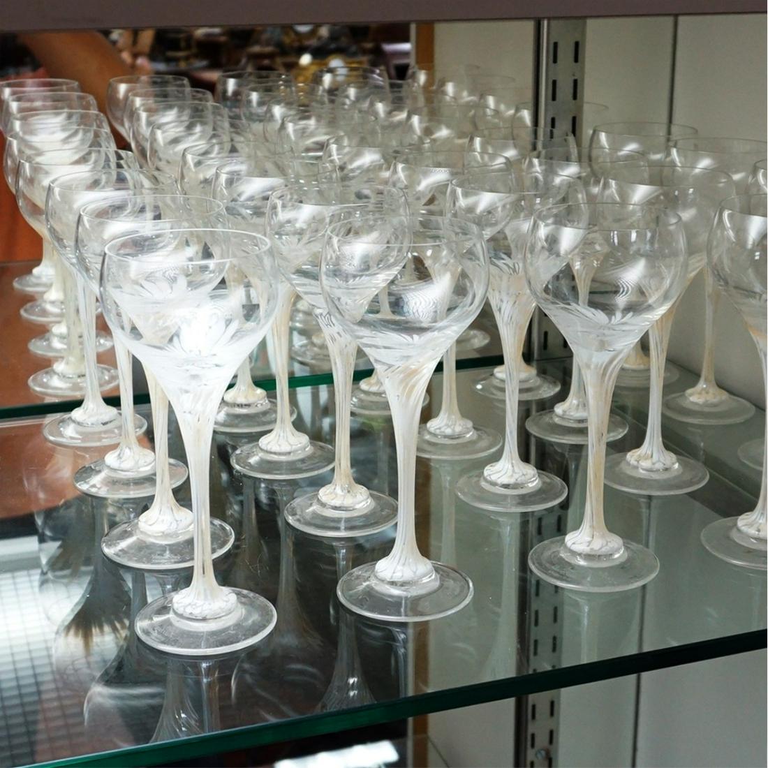 Rosenthal Glasses: Set of Twenty Rosenthal "Snowflower" Crystal White Wine Glasses. Signed. Measures 6-3/4" H, 2-1/2" diameter top. Estimate: $100.00 - $500.00 Domestic Shipping: Third party