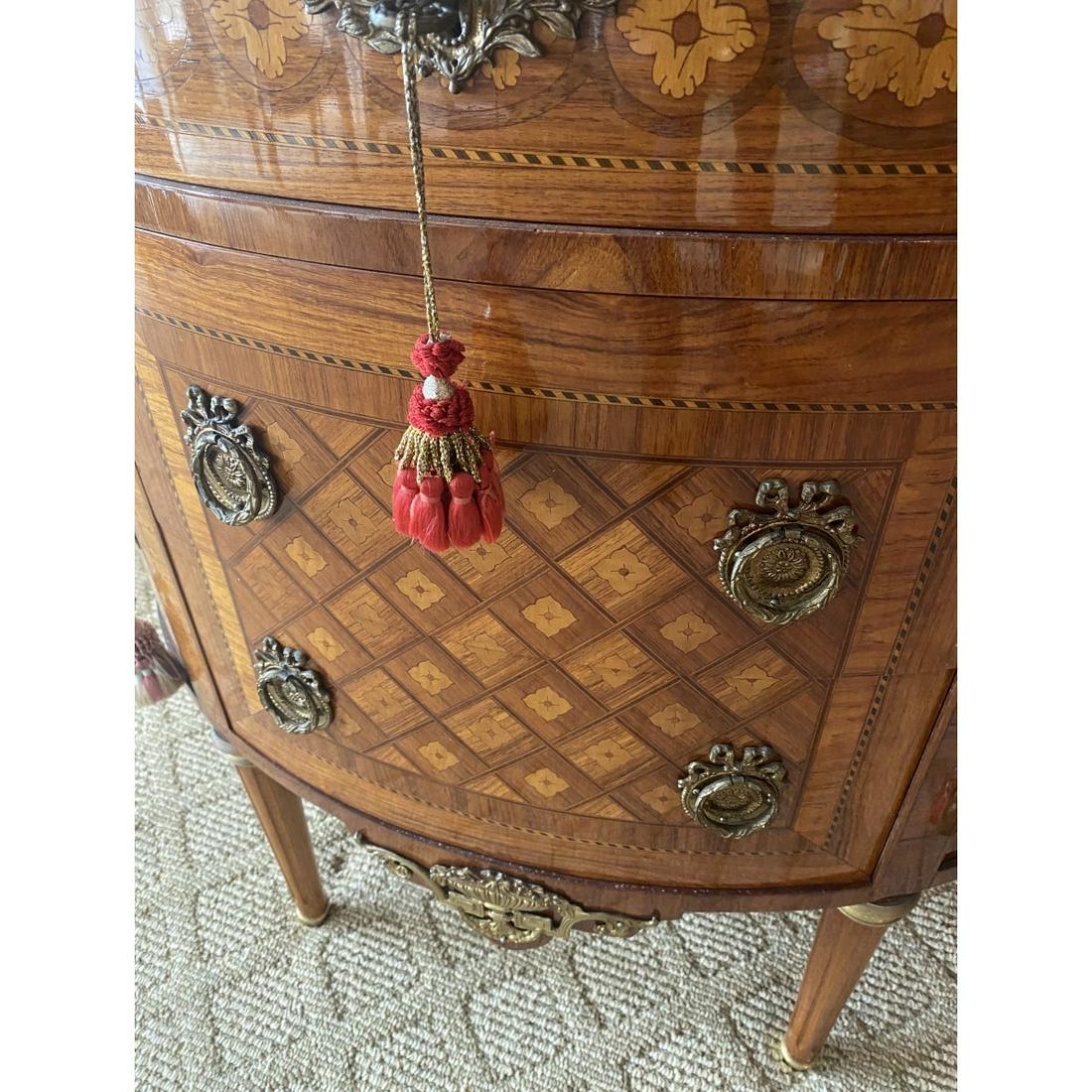 Louis XVI Style Cabinet: Mid 20th Century Louis XVI Style Marquetry and Parquetry Inlaid Demi-Lune Marble Top Cabinet. Features two sliding drawers being flanked by two doors, bronze accents, and stands on fluted tapering leg