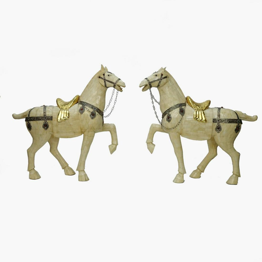 Monumental Chinese Bone Horses: Monumental Pair of Chinese Tessellated Carved Bone and Bone Veneer Tang style Horses with Metal Saddle and Tack. Unsigned. Measure 42" H, 45" L. Approx. weight: 50 lbs each. Condition: Very good condi