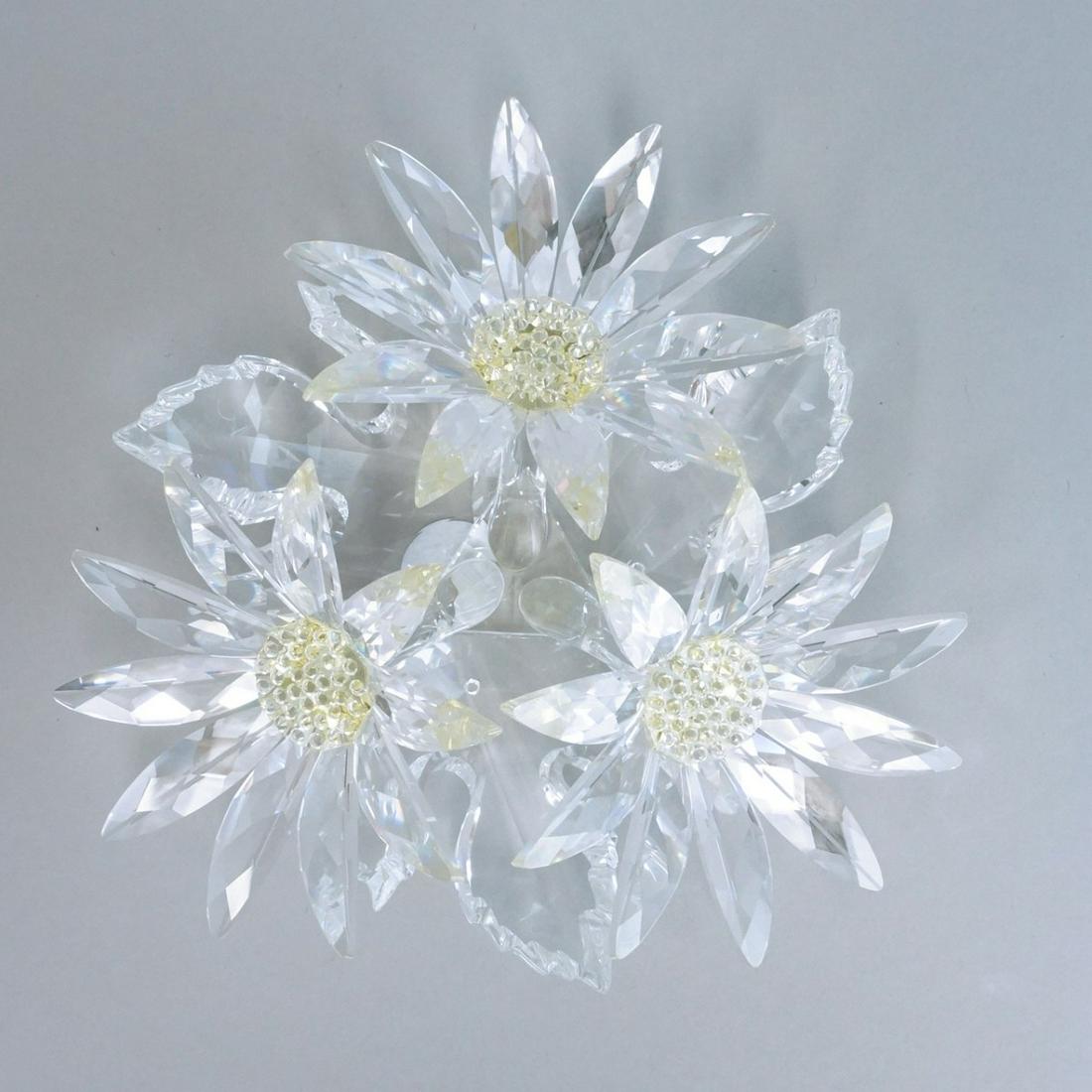 Swarovski Flower Arrangement: Swarovski Maxi Yellow and Clear Crystal Flower Arrangement. Signed. Measures 2-3/4" x 6-1/4". Condition: Good condition. No box. Estimate: $100.00 - $300.00 Domestic Shipping: $58.00