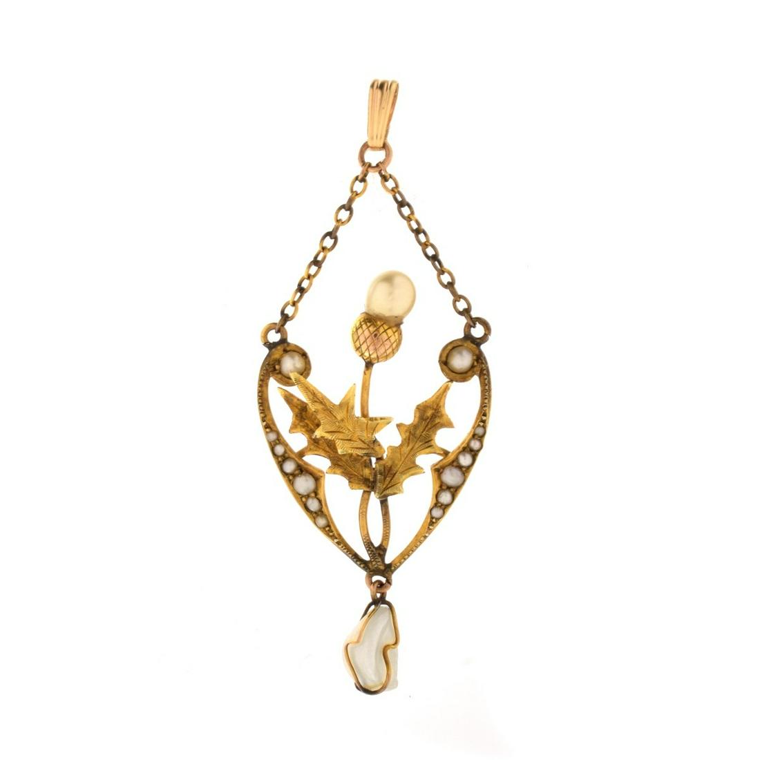 Natural Pearl and 9K Gold Pendant: Antique Probably Scottish Natural Pearl and 9 Karat Yellow Gold Thistle Pendant. Stamped 9ct. Measures 2-1/8" L, 7/8" W. Approx. weight: 3.01 grams. Condition: Very good antique condition. Estimate: $