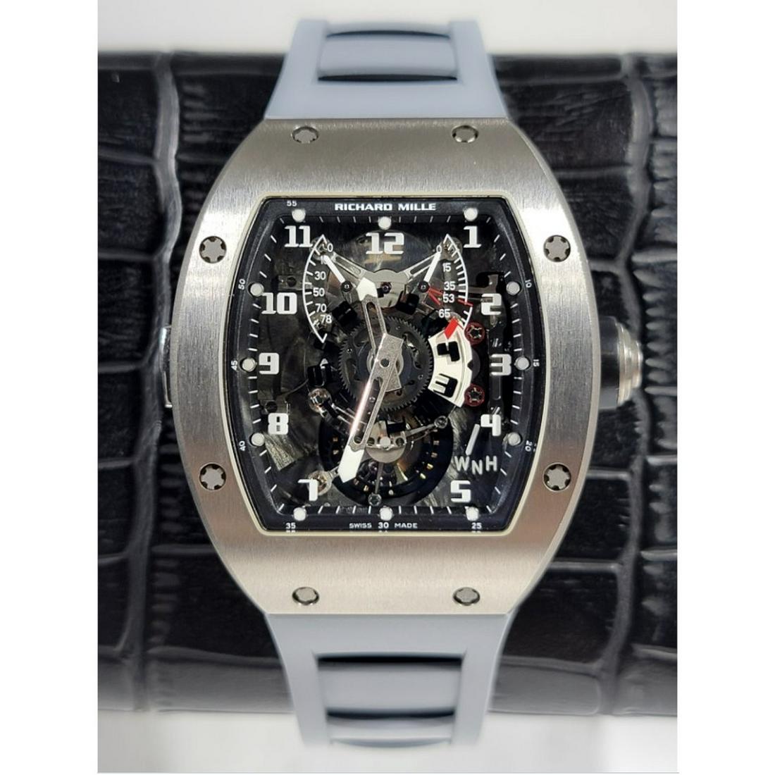 Richard Mille RM003 V2: Rare 2005 Richard Mille RM003 V2 Titanium Tourbillion Watch with Grey Rubber Bracelet. Automatic self-winding movement. Case measures 48 x 39mm. With box and papers. Condition: Very good pre-owned con