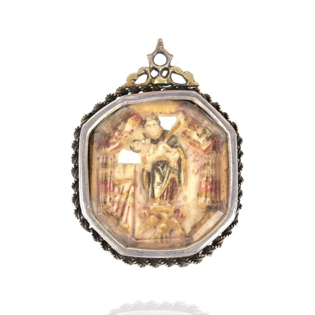 Spanish Colonial Reliquary Pendant: 18/19th Century Spanish Colonial Silver and Carved Bone Double Sided Religious Reliquary Pendant with Beveled Glass. Measures 3" H, 2-1/8" W. Approx. weight: 77.08 grams. Condition: Very good antique 