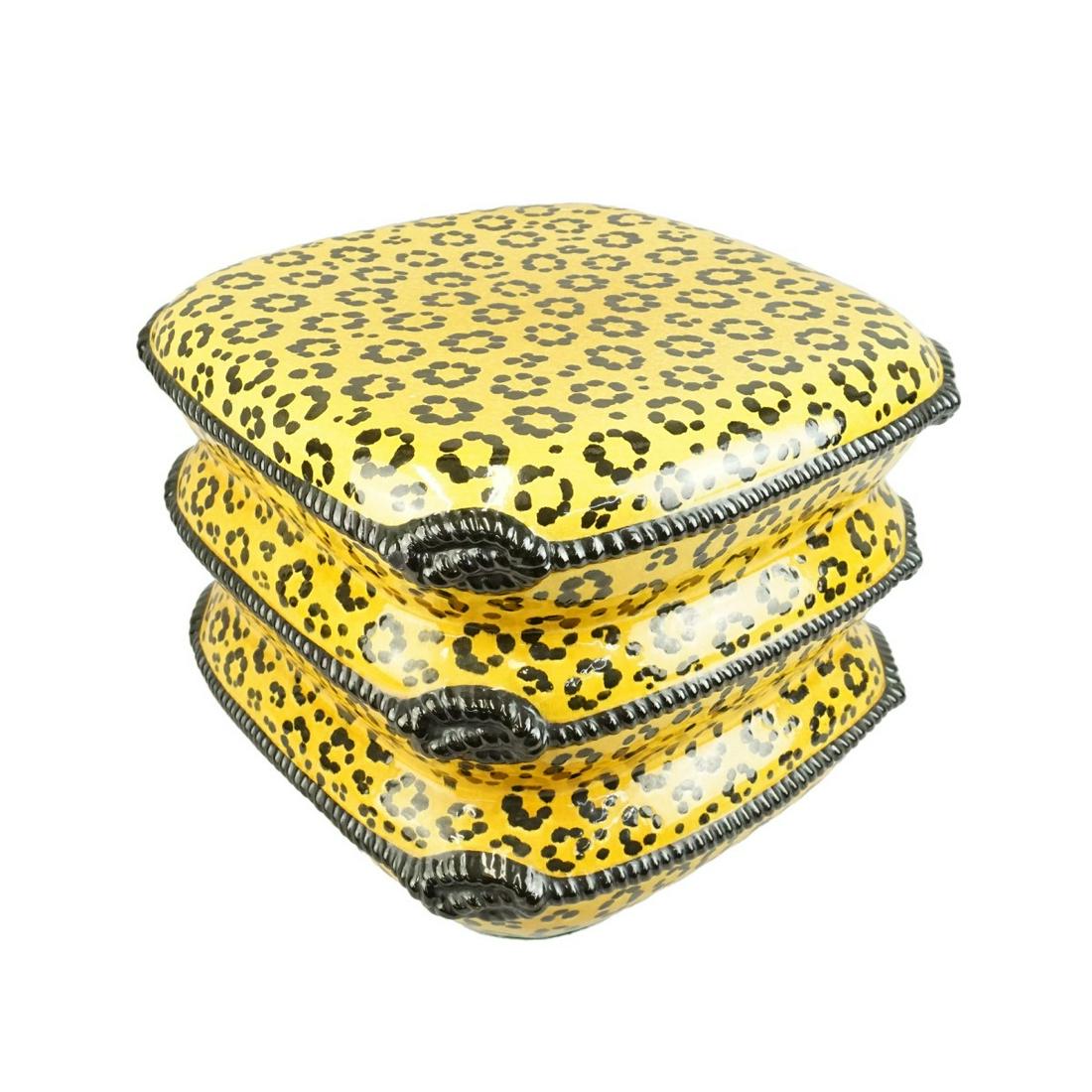 Garden Seat: 20th Century Leopard Glazed Porcelain Pillow Form Garden Seat. Unmarked. Measures 14" x 16-3/4" x 16-3/4". Condition: Good condition. Estimate: $50.00 - $150.00 Domestic Shipping: Third party