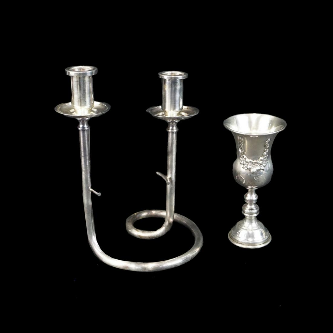 Tableware: Vintage Esco Sterling Silver Kiddush along with Vintage French Silverplate Two-Arm Candelabra. Kiddush stamped. Candelabra has french hallmarks. Cup measures 6-3/4" x 3-1/8". Candelabra measures 10-1/