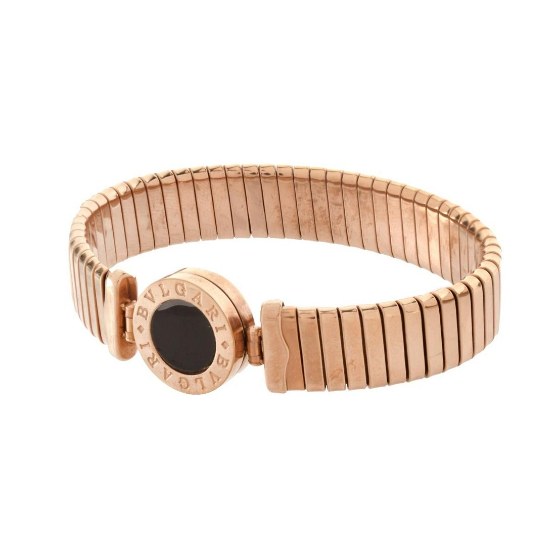 Bulgari Replica Bracelet: Bulgari Replica Pink Gold Tone Metal and Black Onyx Bracelet. Measures 6-1/4" L, 5/8" W. Condition: New condition Estimate: $100.00 - $200.00 Domestic Shipping: $34.00