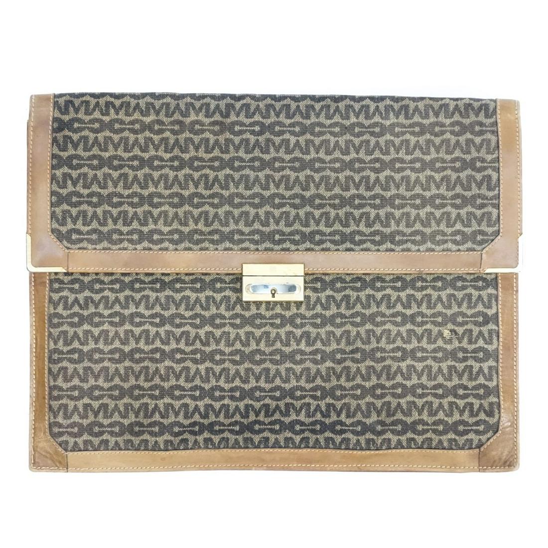 Mark Cross Portfolio: Vintage Mark Cross Monogram Canvas Portfolio / Document Holder. Gold tone hardware. Stamped on the lock and on interior. Flap closure that opens to several patch pockets. Measures 12" x 15". Condition