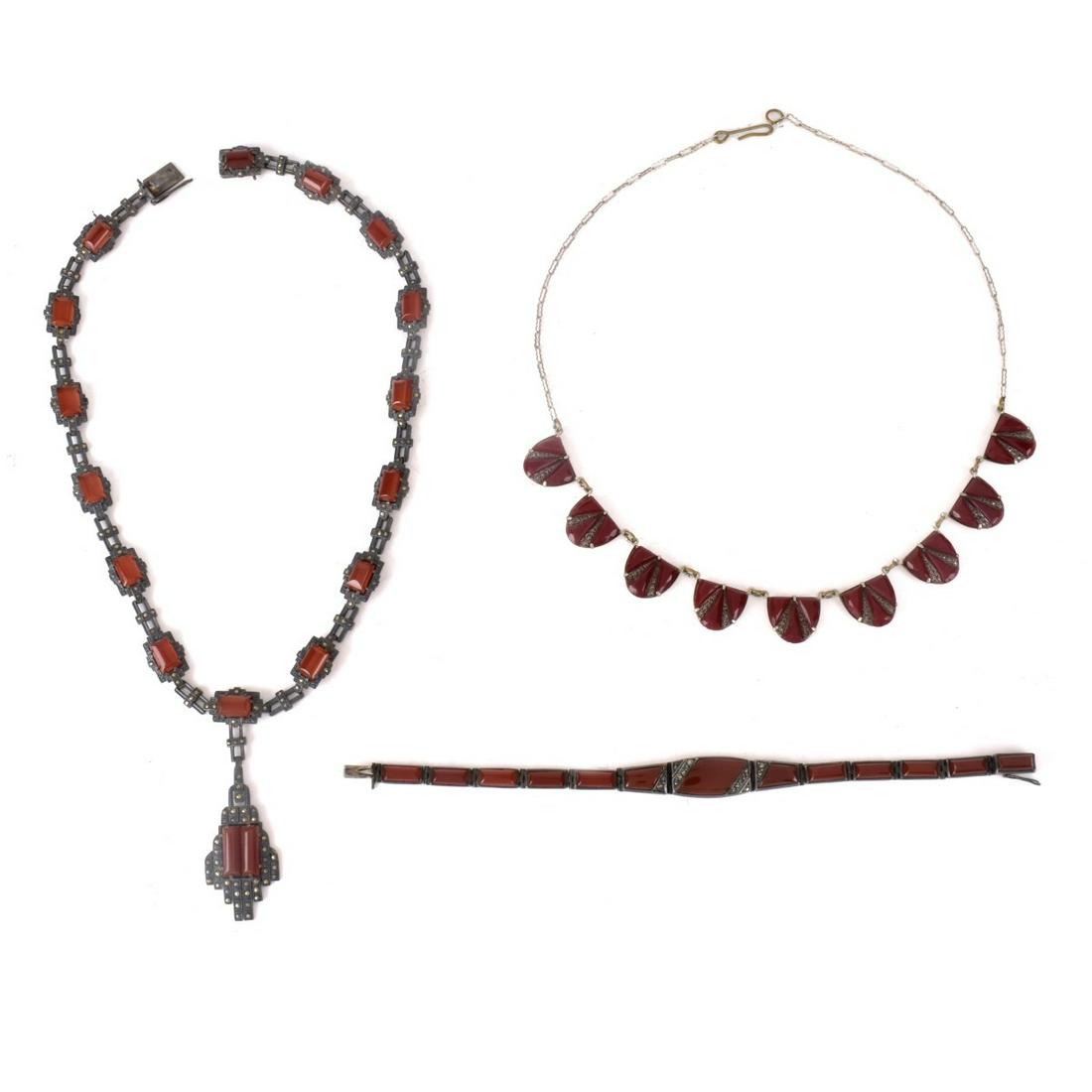 Antique Hardstone and Marcasite Jewelry: Antique Hardstone and Marcasite Jewelry. To include hardstone and marcasite pendant necklace and bracelet set in silver and a hardstone and marcasite necklace set in white metal. Pendant necklace meas