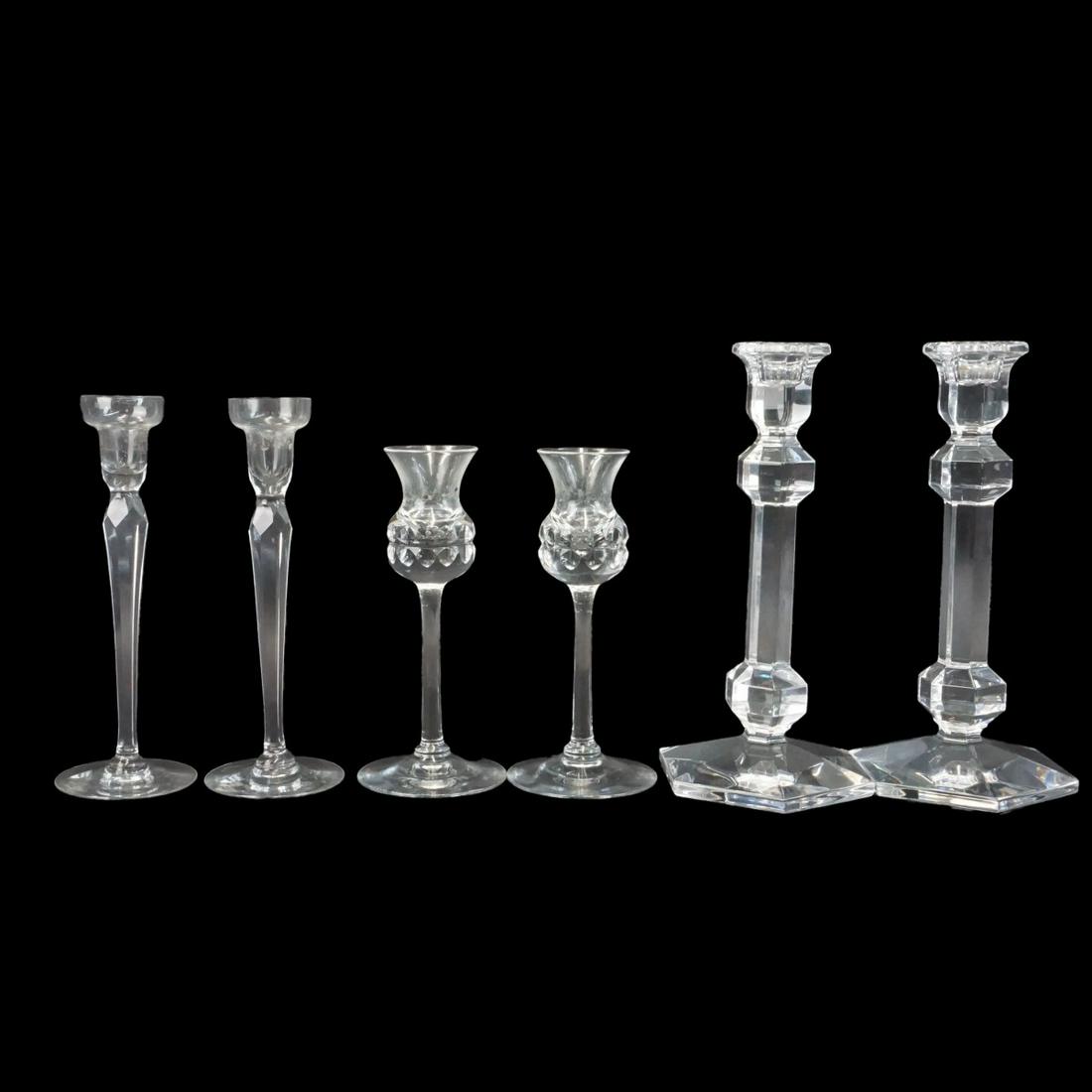 Candlesticks: Pair of Val St. Lambert Crystal Candlesticks, Pair of Orrefors Crystal Candlesticks, and Pair of Goran Warff for Kosta Crystal Candlesticks. Each is appropriately signed. Tallest pair measures 9-1/2"