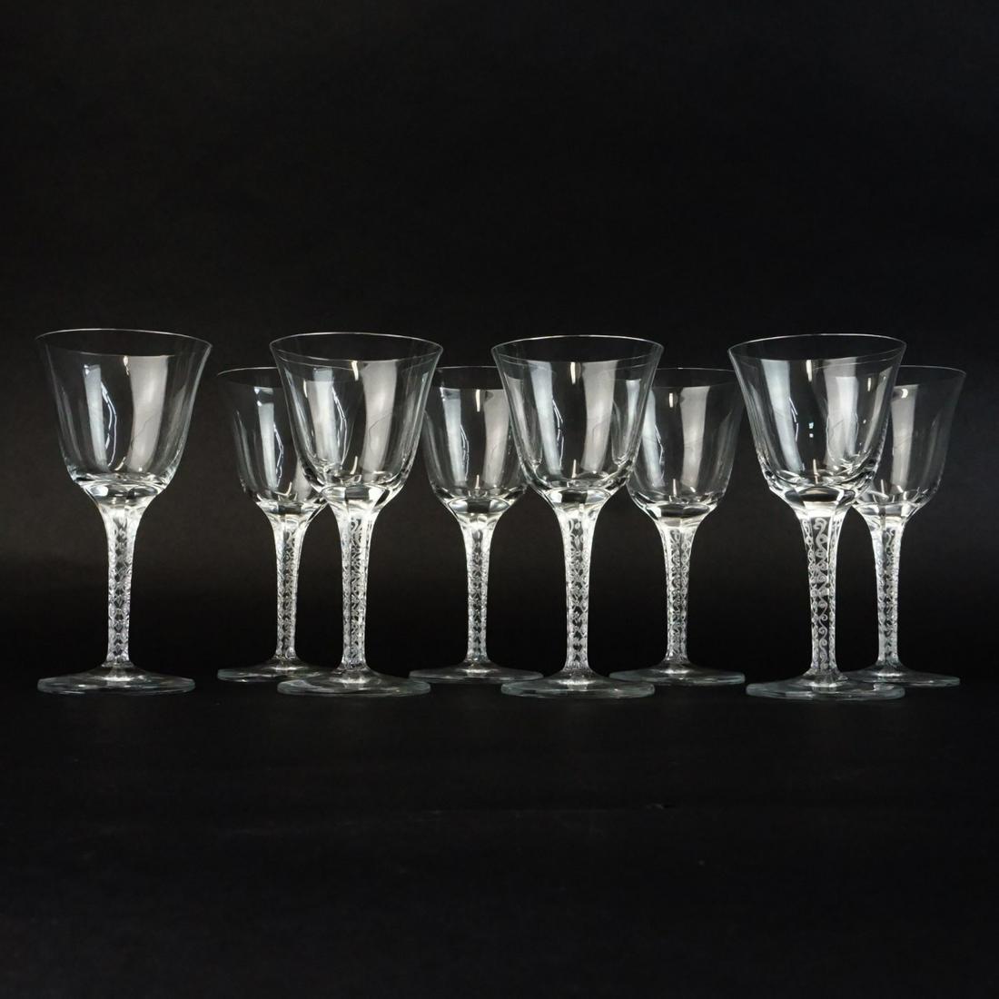 Lalique Wine Glasses: Set of Eight Lalique "Treves Clear" Crystal Wine Glasses. Signed. Measures 5-3/4" x 2-7/8" diameter top. Condition: Good condition. Estimate: $200.00 - $400.00 Domestic Shipping: $78.00
