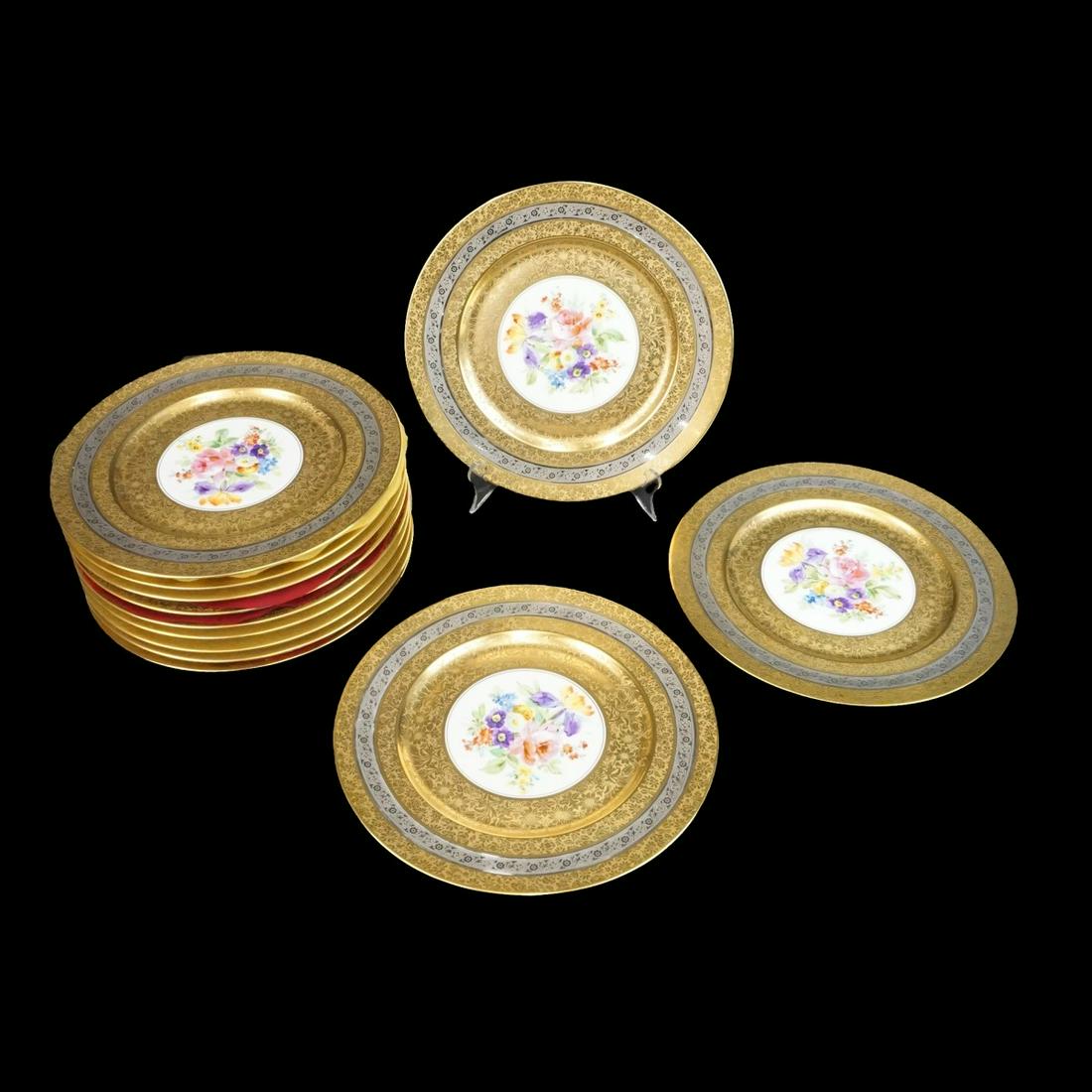 Royal Leighton Dinner Plates: Set of Twelve Royal Leighton Gold and Silver Encrusted Hand Painted Porcelain Dinner Plates. Signed. Measures 10-3/4". Condition: Good condition. Estimate: $200.00 - $400.00 Domestic Shipping: $88.00