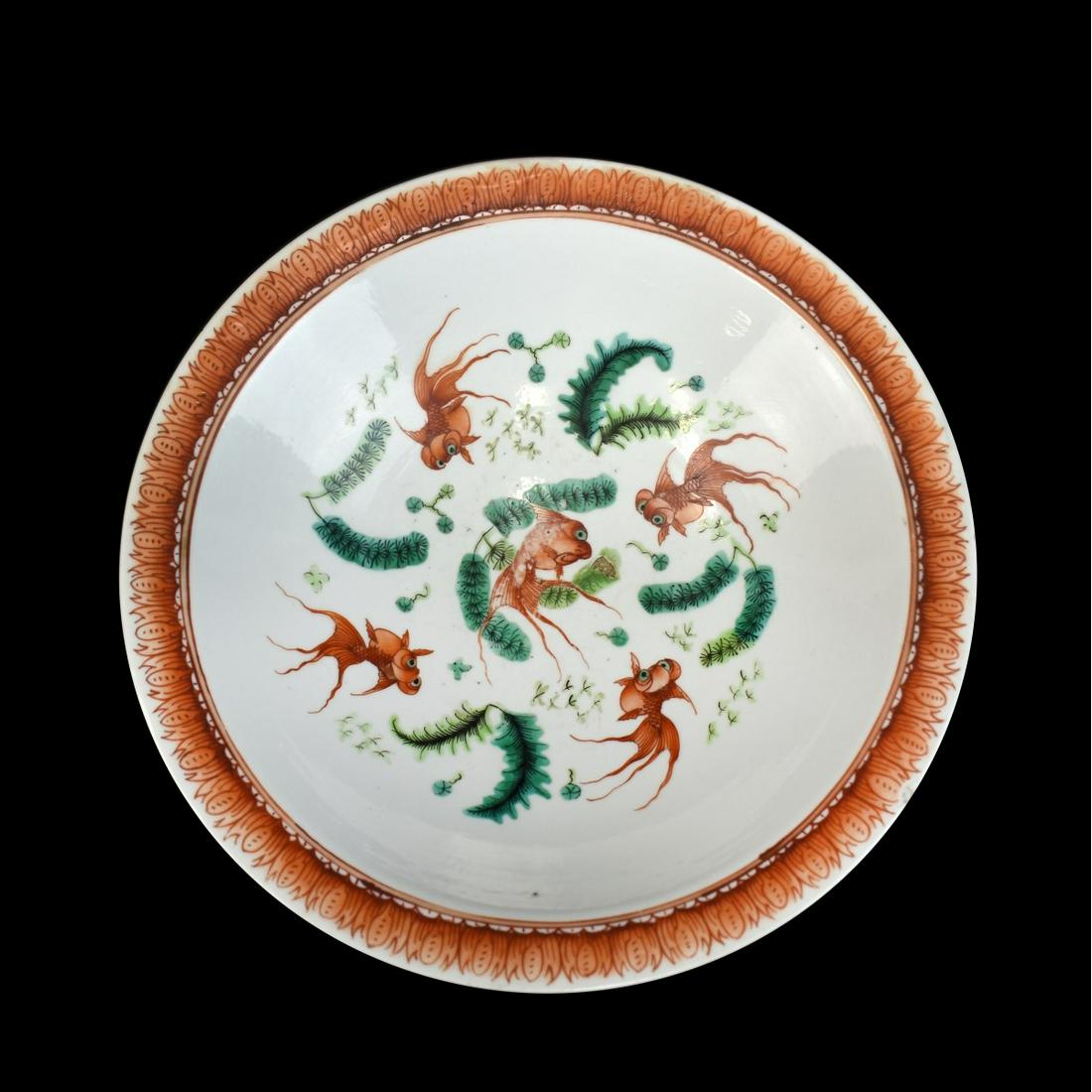 Chinese Footed Bowl: 19/20th Century Chinese Famille Verte Porcelain Footed Bowl, 19/20th Century. Unsigned. Dragons chasing flaming pearls and fish motif. Measures 3-1/4" x 10-1/8". Condition: Small nick or wear to an ar