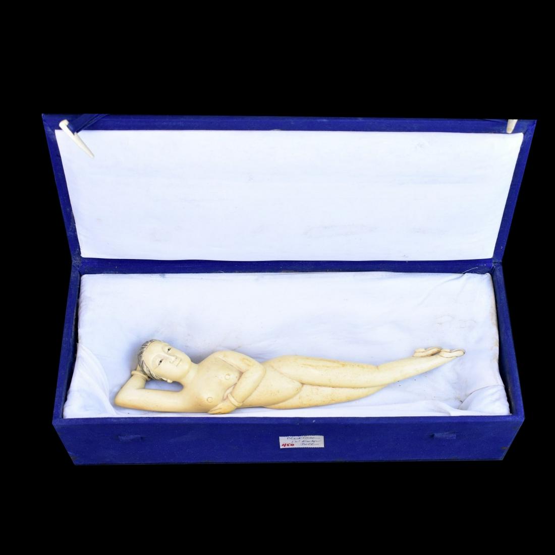 Chinese Recumbent Nude Figurine: Large Chinese Polychrome Carved Recumbent Nude Figurine Presented on a Wooden Stand. Fitted ox to accompany the lot. Carving measures 2-5/8" x 12" x 2". We Will Not Ship This Item Out of State of Flor