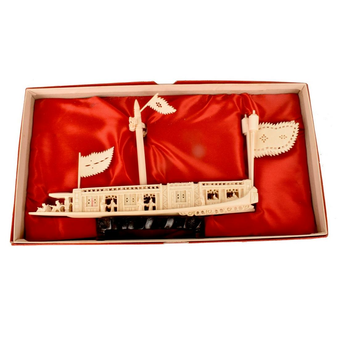 Chinese Carved Boat: Chinese Intricately Carved Boat Presented on a Wooden Stand. Fitted box to accompany the lot. Overall measures 5-1/2" x 10". We Will Not Ship This Item Out of State of Florida. Anyone Having This Item