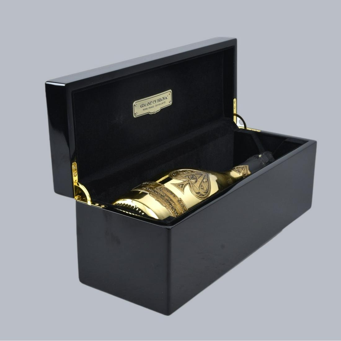 Armand de Brignac Ace of Spades Champagne: Bottle of Armand de Brignac Ace of Spades Gold Brut Champagne. Original Casket and pouch to accompany the lot. 750 ML. Estimate: $100.00 - $500.00 Domestic Shipping: $66.00 Condition: Sealed unopened 