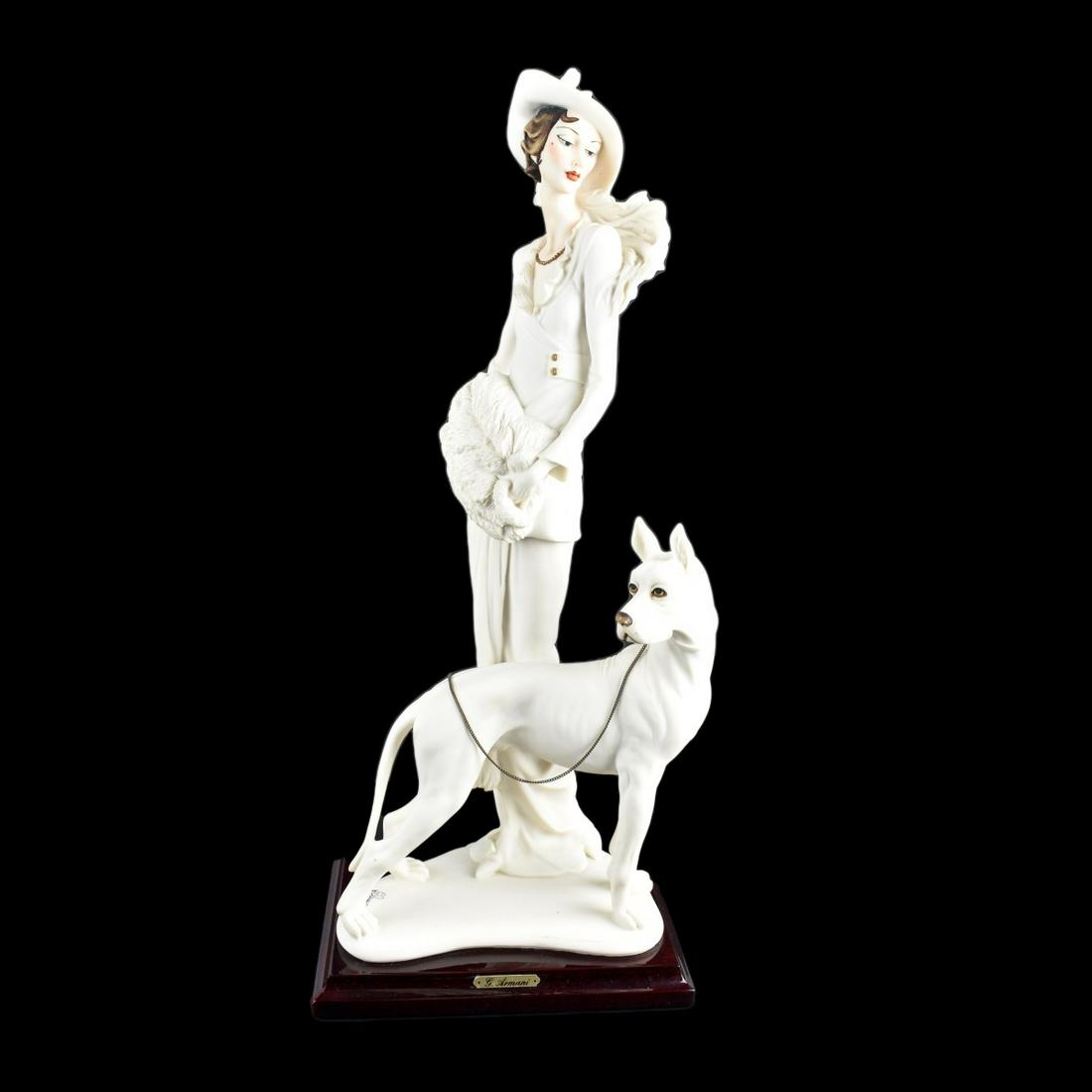 Giuseppe Armani Figurine: Giuseppe Armani "Art Deco Lady with Dog" Porcelain Figurine. Bears all proper signatures and markings. Overall measures 18-5/8" x 7-5/8" x 6". Estimate: $100.00 - $300.00 Domestic Shipping: Third part