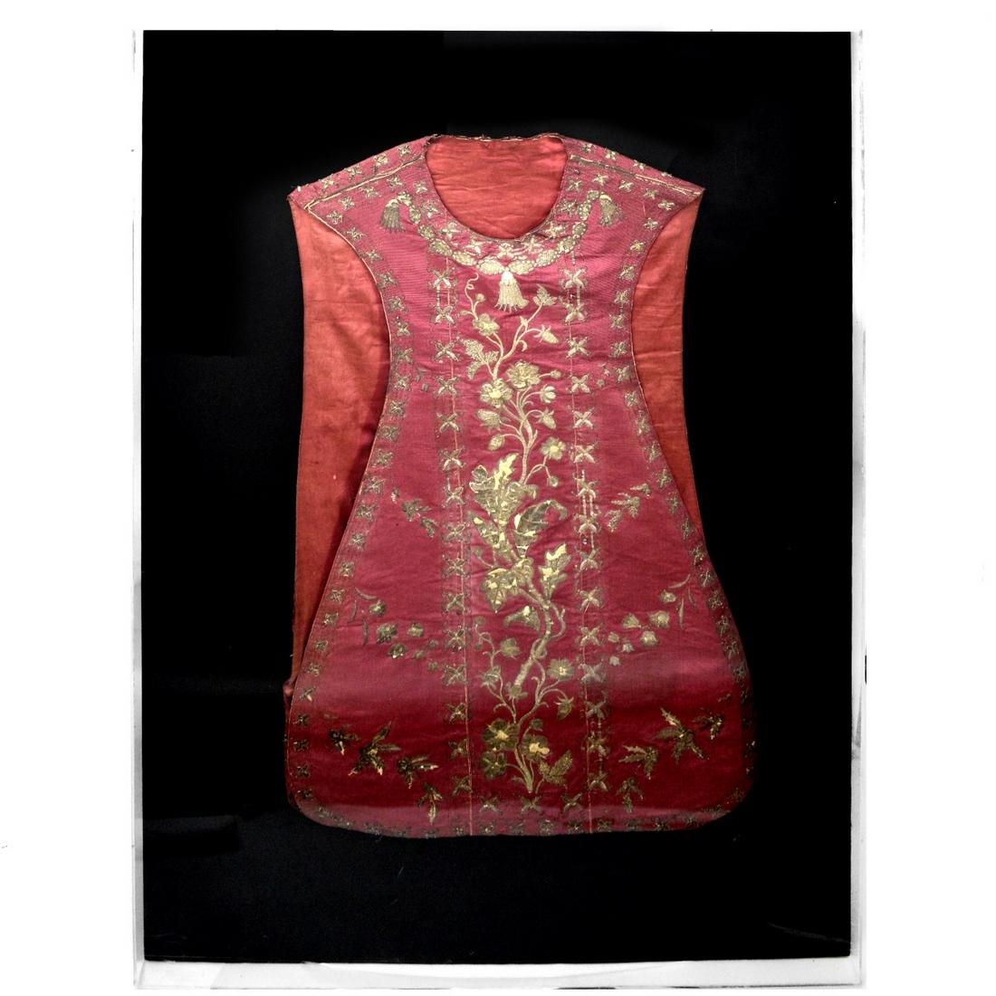 Antique Spanish Silk Embroidered Chasuble: Antique Spanish Silk Embroidered Chasuble Presented in a Shadowbox Display. Garment measures 43" x 27". Frame measures 59-1/4" x 40-1/2" x 2-1/8". Estimate: $300.00 - $500.00 Domestic Shipping: Third 