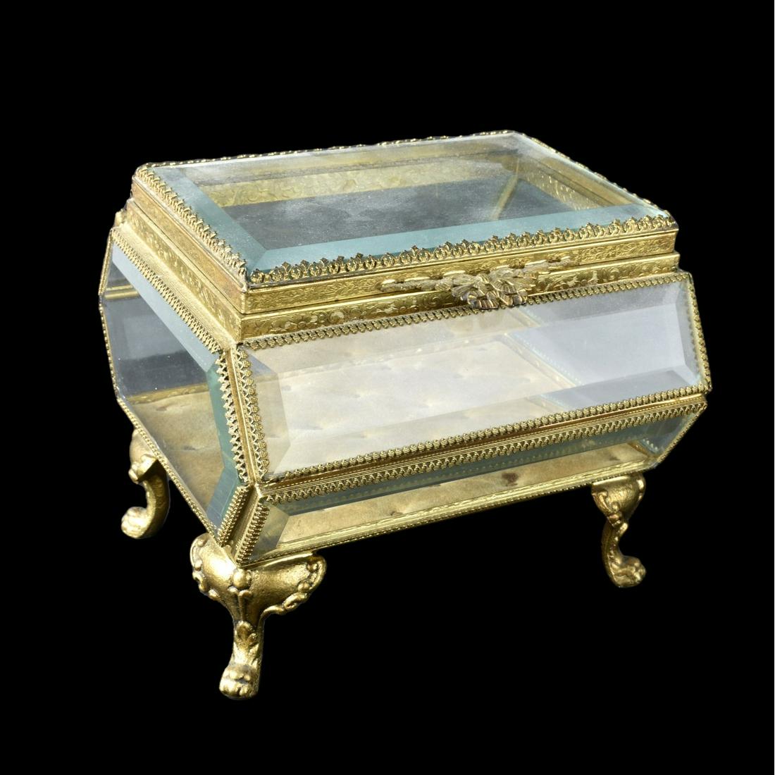 Antique French Dresser Box: Antique French Brass and Glass Footed Dresser Box. Measures 5-3/4" x 6-5/8" x 6". Estimate: $100.00 - $300.00 Domestic Shipping: $72.00 Condition: Good condition.