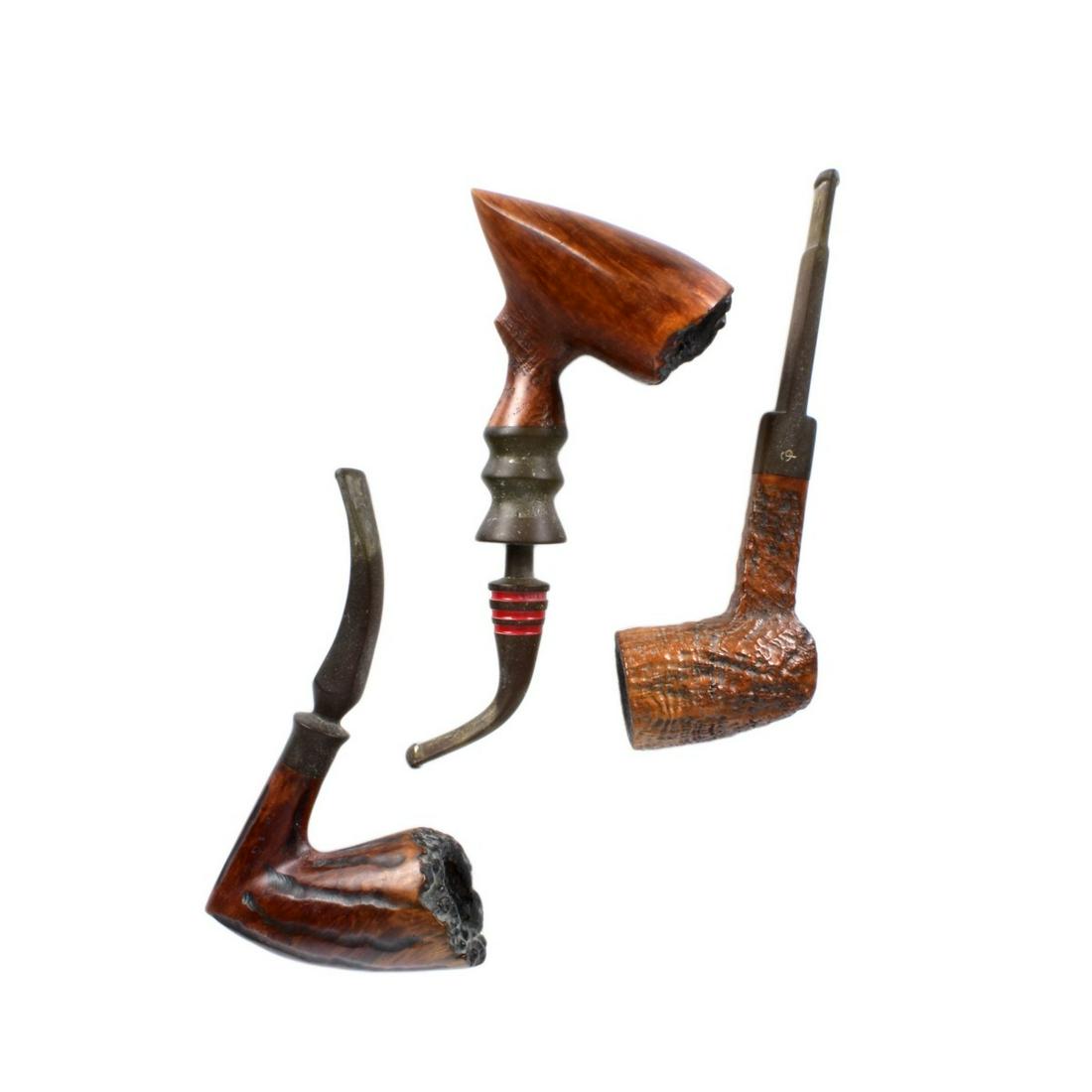 Three Hand Carved Smoking Pipes (1 of 4)
