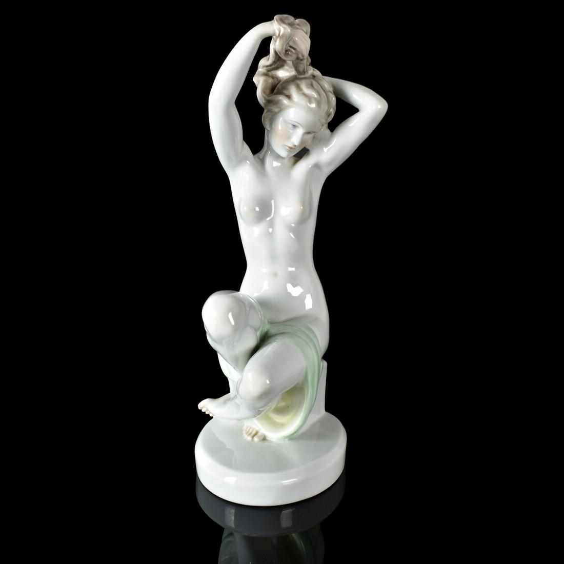 Large Herend Nude Porcelain Figurine: Large Herend Nude Porcelain Figurine. Signed and numbered 5706 on the base. Measures 14-3/4" x 6" x 6-1/2". Estimate: $100.00 - $300.00 Domestic Shipping: $75.00 Condition: Good condition.