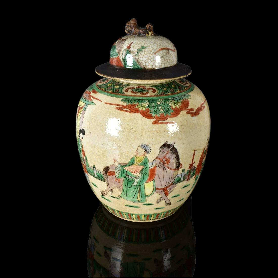 Antique Chinese Famille Vert Ginger Jar: Antique Chinese Nankin Famille Vert Porcelain Covered Ginger Jar with Foo Dog Finial. Unsigned. Measures 11-1/2" x 8". Estimate: $50.00 - $100.00 Domestic Shipping: $75.00 Condition: Small chip at the