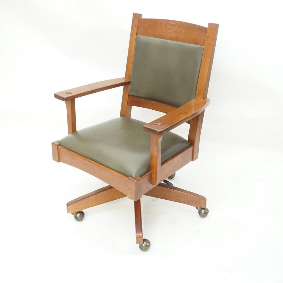 Stickley Swivel Desk Chair: Stickley (Mission Collection) Arts & Craft Oak and Leather Upholstered Swivel Tilt Desk Chair. Stamped. Measures 38" x 24-3/4" x 22-1/2". Seat height: 19". Estimate: $300.00 - $1200.00 Domestic Shippi