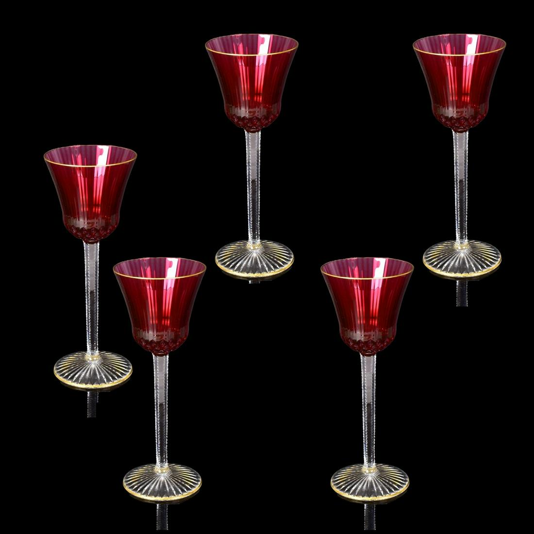 St. Louis Ruby Color Apollo Wine Stems: Set of Five St. Louis "Apollo Gold" Ruby Color Crystal Hock Wine Stems. Signed on the base. Measures 8-1/4" H, 3-1/4" diam. top. Estimate: $500.00 - $800.00 Domestic Shipping: Third party Condition: G