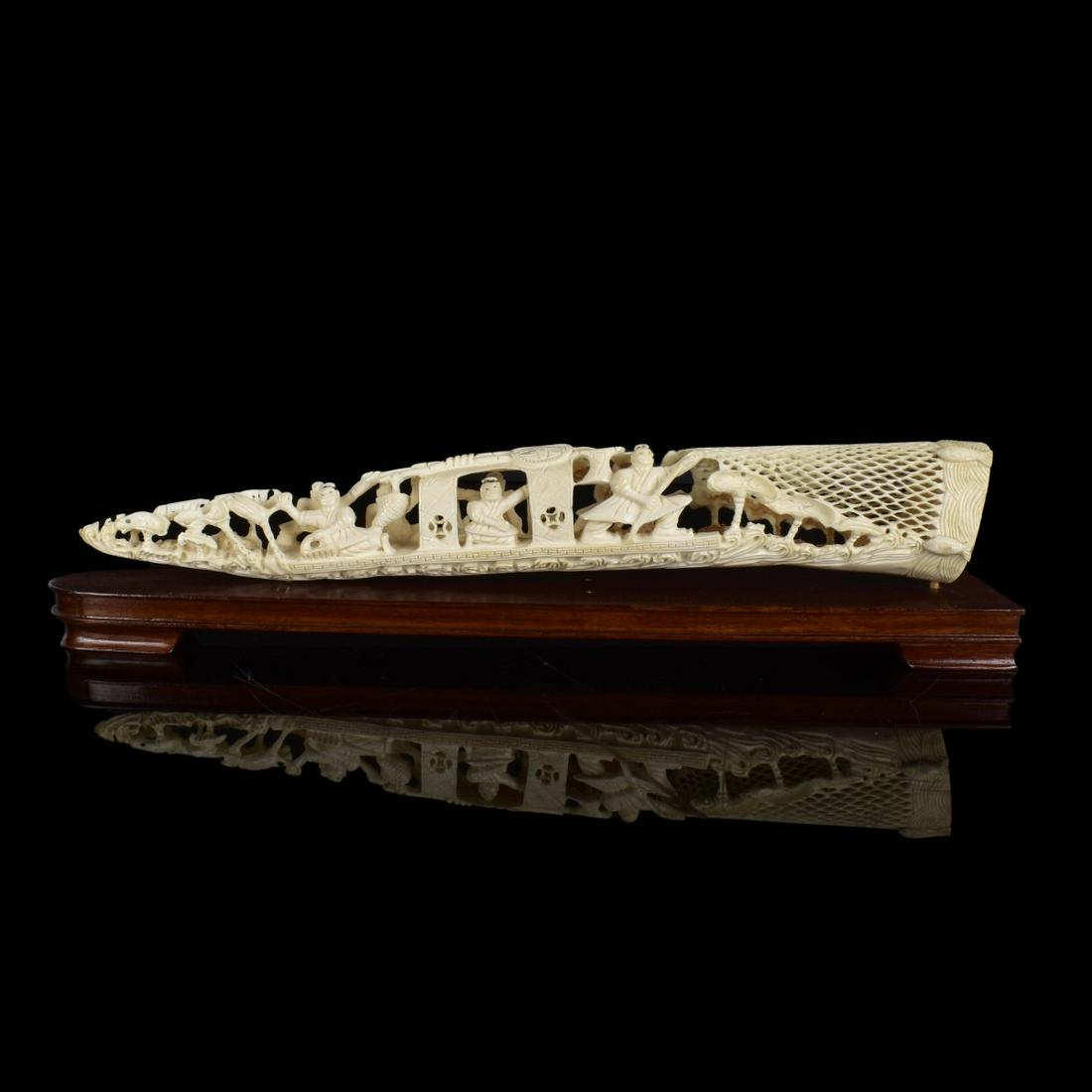 Antique Chinese Deep Relief Tusk: Antique Chinese Polychrome Painted Deep Relief Tusk Presented on a Wooden Base. Signed. Formed in the style of a ship. Measures 2-1/8" x 13" x 1-3/4" w/o base). We Will Not Ship This Item Out of State