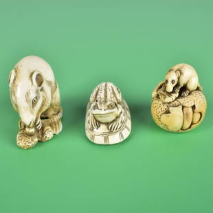 Three Antique Japanese Miniature Netsukes: Lot of Three Antique Japanese Miniature Animal Netsuke Figurines. Each signed on the base. Tallest measures 1-1/2" x 1-5/8" x 1". Smallest figurine measures 1" x 1" x 1-1/4". We Will Not Ship This Ite