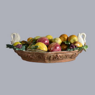 Antique Majolica Centerpiece w/ Capodimonte Fruits: Antique Majolica Crackle Glazed Centerpiece Assembled with (15) Antique Capodimonte Porcelain Fruits. Centerpiece is unmarked. Fruits are signed. Centerpiece measures 7-1/2" x 21-3/4" x 15-1/2". Avera