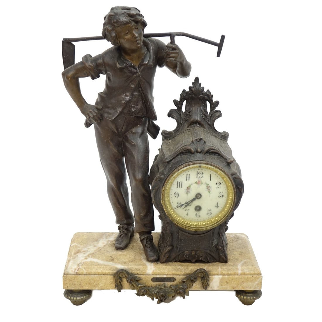 After: Louis Moreau (1855 - 1919) Bronze Clock: After: Louis Moreau, French (1855 - 1919) White Metal and Marble Mantle clock. Tag inscribed Le Faucheaur par Moreau attached to the surface. foundry: Frabrication Francaise, France. Clock measures 19