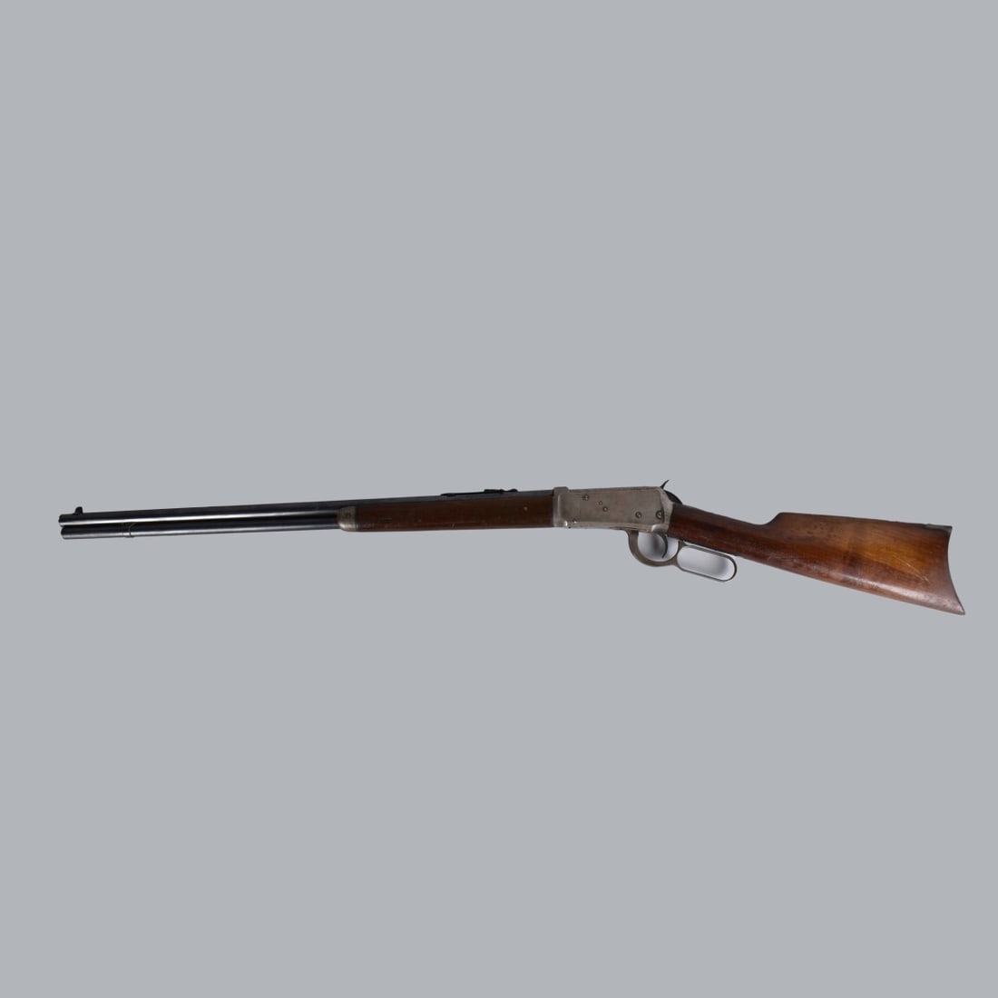 Winchester Model 94 Lever Action Rifle: Winchester Model 94 Lever Action Rifle. Signed on plate below chamber on stock Winchester 94 and to bottom forward of the trigger 907274, Barrel written with name and .30 WCF. We Will Not Ship Firearm