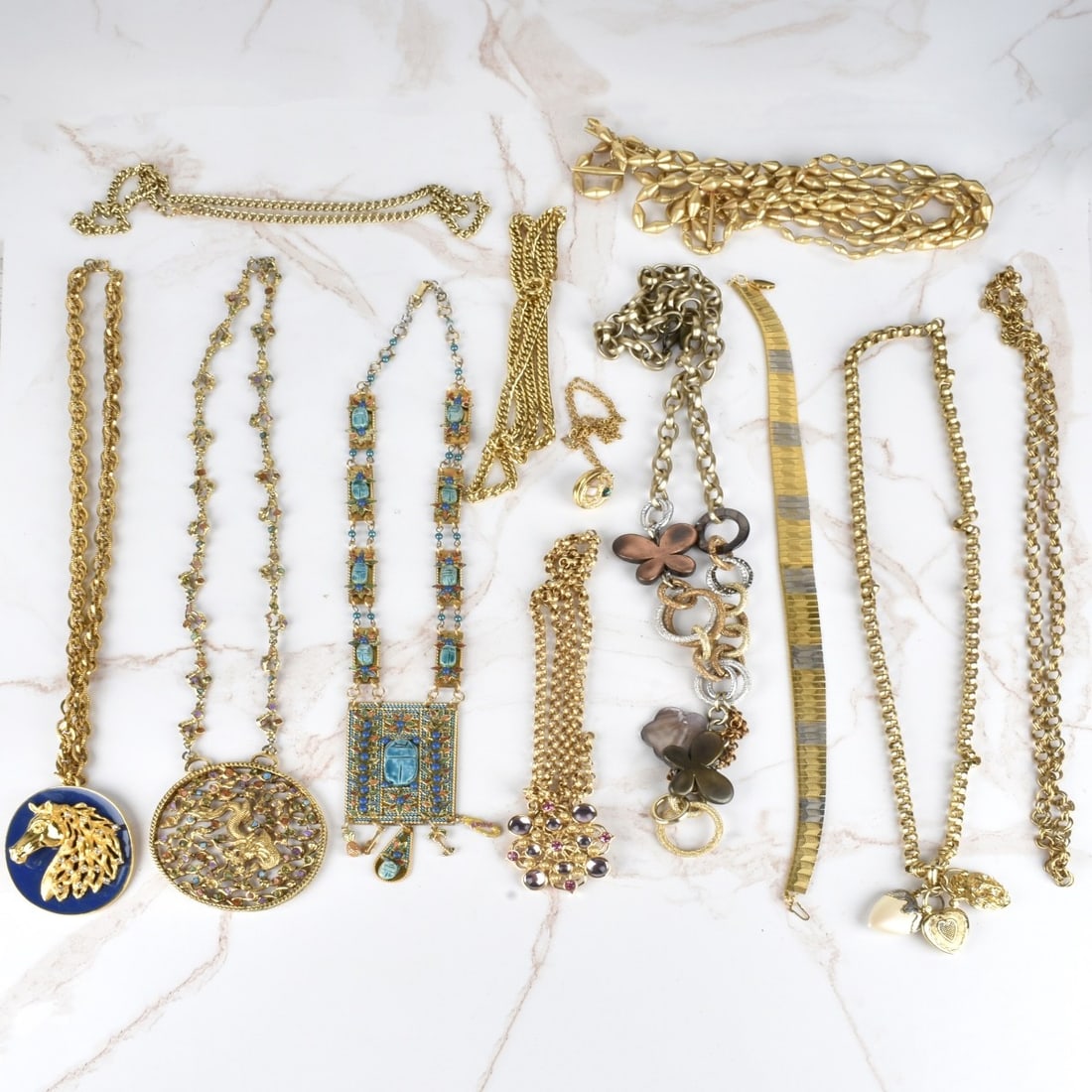 Collection of Fashion Necklaces: Collection of Twelve Vintage Fashion Necklaces. Gold tone metal variously accented with faux diamonds, faux gemstones, faux turquoise, enamel and more. Various makers and styles. Condition: Good vinta