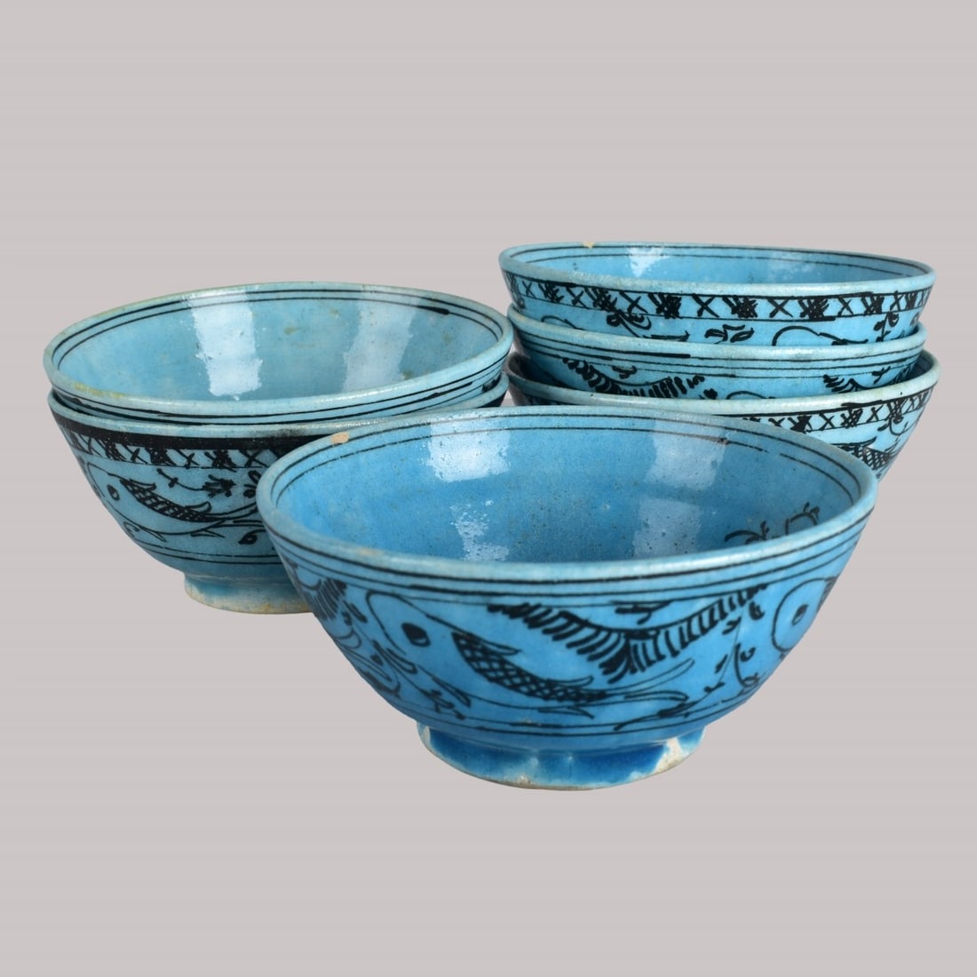 Six Persian Kashan Pottery Bowls: Set of Six Persian Kashan Turquoise Glazed Pottery Bowls. Two are marked on the base. Each measuring approx. 2-1/2" x 5" diam. Condition: Each have normal rubbing to the surface. Two have small nicks 